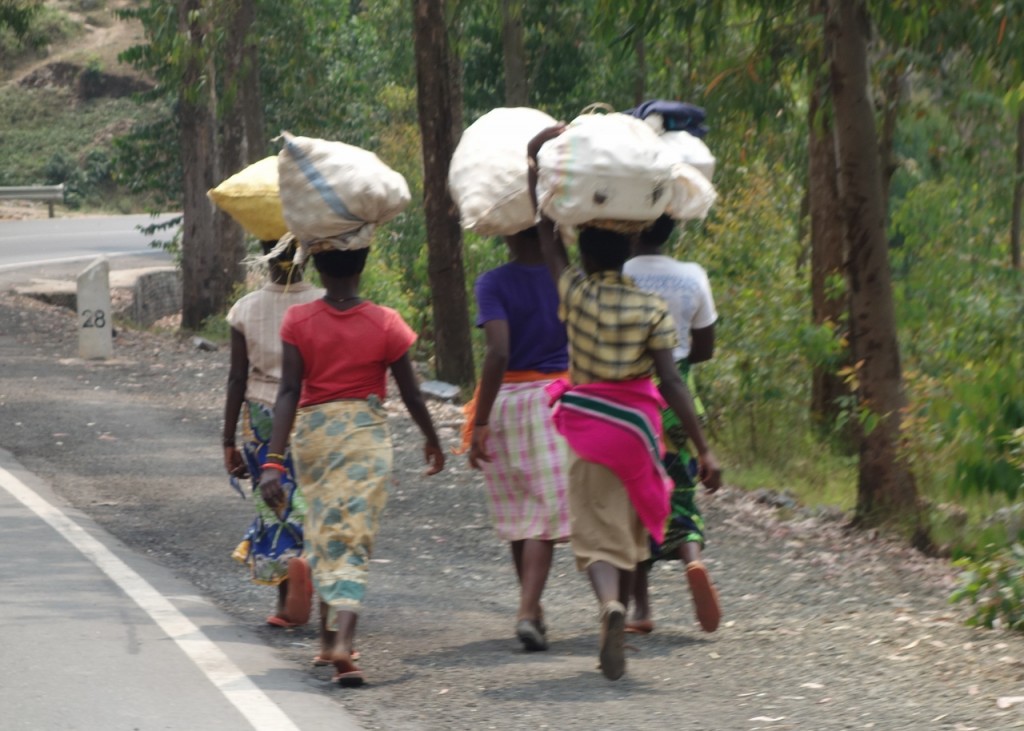 Rwandan women carried anything and everything n their heads.
